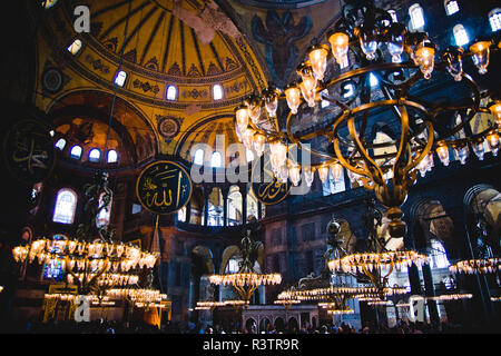 Istanbul, Turkey - April 5, 2012: Interior of the historic Basilica of Saint Sophia, mosque for the most visited Muslim cult in Istanbul. Stock Photo