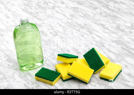 Liquid Dish Soap With A Sponge, Isolated On White Stock Photo, Picture and  Royalty Free Image. Image 28638651.