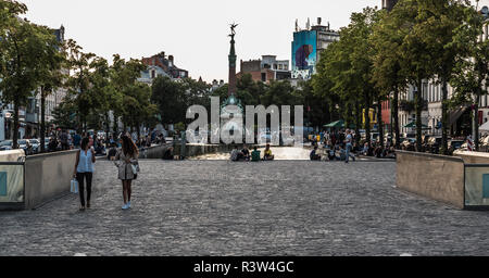Two beautiful woman walking over the Saint Catherine Square in the summertime in Brussels, Belgium Stock Photo