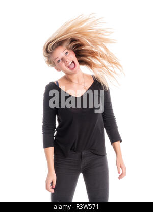 young woman shakes her wild mane Stock Photo