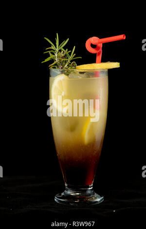 Long Island cocktail with vodka, tequila, rum, cin and lime juice with isolated black background Stock Photo