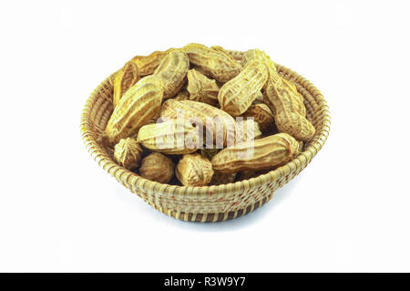 peanuts isolated / cooking of peanuts boiled in basket isolated on white background - ripe peanuts peeled Stock Photo