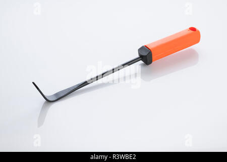 Gardening Tools: Close up of a Cape Cod Weeder Isolated on White Background Shot in Studio. Stock Photo