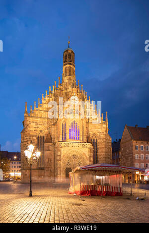 Frauenkirche in Main Market Square at dusk, Nuremberg, Bavaria, Germany Stock Photo