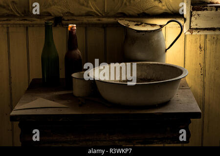 Bottles, wash basin, and water pitcher, Bodie State Historic Park, California. Stock Photo