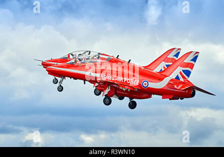 Two of the RAF Red Arrows display team take off in close formation. Stock Photo