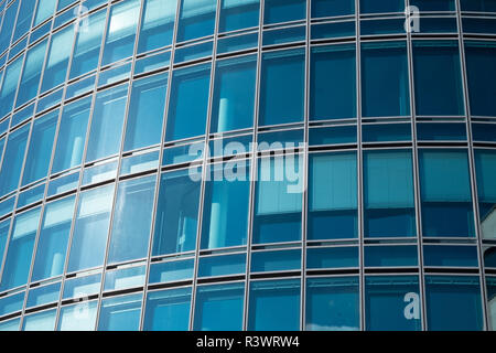 office building with window in blue Stock Photo