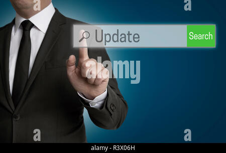 update internet browser is operated by businessman Stock Photo