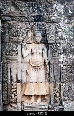 Angkor Cambodia. Detail of of an Aspara from stonework in the 12th century Bayon state temple of Jayavarman VII part of Angkor Thom, Angkor,Cambodia Stock Photo