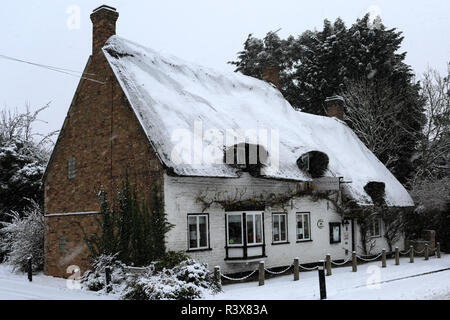 Snow on the Cherry House restaurant, Church street, Werrington Village, Cambridgeshire, England, UK Stock Photo