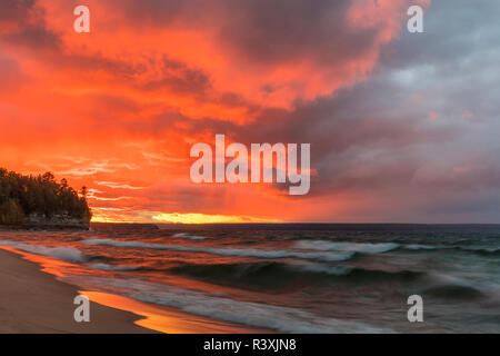 Dramatic sunset light along Miners Beach in Pictured Rocks National Lakeshore, Michigan, USA Stock Photo