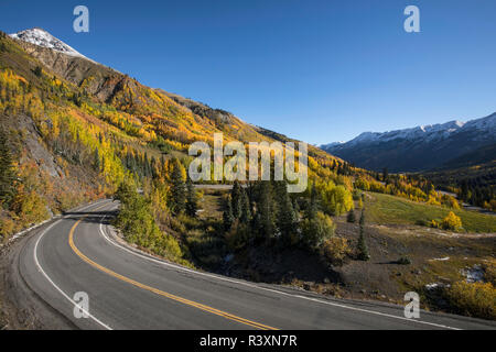 Autumn aspen trees and Million Dollar Highway near Crystal Lake, Ouray, Colorado Stock Photo