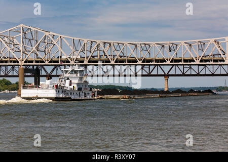 Barge loaded with coal going up the Ohio River, between Louisville, Kentucky and Jeffersonville, Indiana Stock Photo