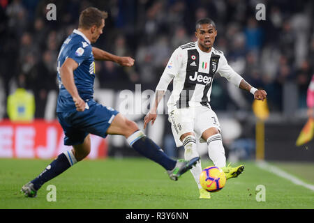 Turin, Italy. 24th Nov 2018. Photo LaPresse - Fabio Ferrari November 24, 2018 Turin, Italy sport soccer Juventus Fc vs Spal - Italian Football Championship League A TIM 2018/2019 - Allianz Stadium. In the pic:Douglas Costa (Juventus F.C.); Credit: LaPresse/Alamy Live News Stock Photo