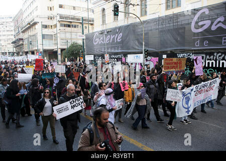 Athens, Greece. 24th Nov, 2018. People take part in a march mainly focusing on violence against women on the eve of the International Day for the Elimination of Violence against Women in Athens, Greece, on Nov. 24, 2018. On the eve of the International Day for the Elimination of Violence against Women which falls on Nov. 25 each year, Greek authorities, experts and victims of abuse called on women suffering in silence across the country to 'speak up.' Credit: Marios Lolos/Xinhua/Alamy Live News Stock Photo