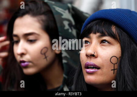 Athens, Greece. 24th Nov, 2018. People take part in a march mainly focusing on violence against women on the eve of the International Day for the Elimination of Violence against Women in Athens, Greece, on Nov. 24, 2018. On the eve of the International Day for the Elimination of Violence against Women which falls on Nov. 25 each year, Greek authorities, experts and victims of abuse called on women suffering in silence across the country to 'speak up.' Credit: Marios Lolos/Xinhua/Alamy Live News Stock Photo