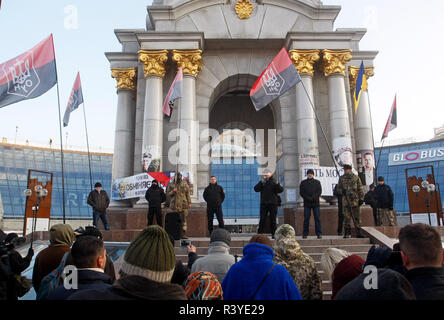 Ukrainian activists of the Organization of Ukrainian Nationalists (OUN) attend their a rally on the Independence Square in Kiev. The rally of the activists dedicated to the 5th Euromaidan Revolution in Ukraine and against Ukrainian Orthodox Church of the Moscow Patriarchate in Ukraine. Stock Photo