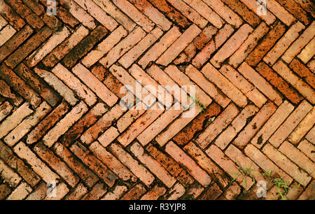 Beautiful Pattern of Terracotta Brick Pathway in Old Town of Nan, Northern Region, Thailand Stock Photo