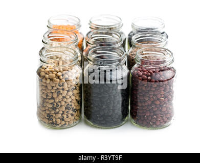 various dried legumes in jars Stock Photo