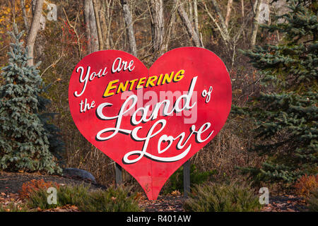 USA, Pennsylvania, Pocono Mountains, East Stroudsburg, You are Entering the Land of Love, sign to well known US honeymoon area Stock Photo