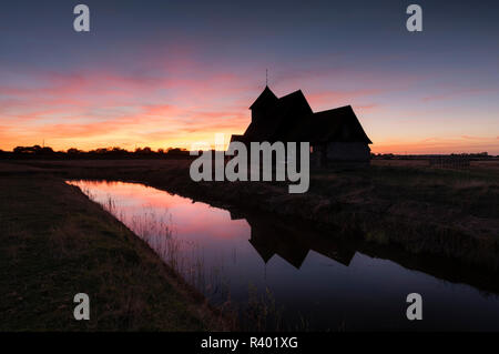 St. Thomas a Becket Church, also known as Fairfield Church, silhouetted at twilight on Romney Marsh, Kent.