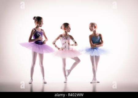 Three little ballerinas in dance studio Stock Photo