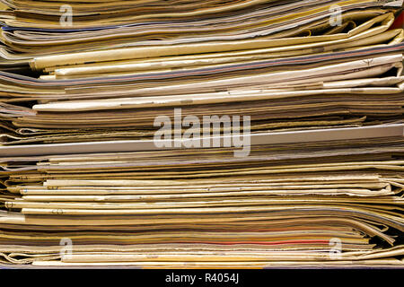 Pile of old newspapers and magazines, stack, side view, Stock Photo