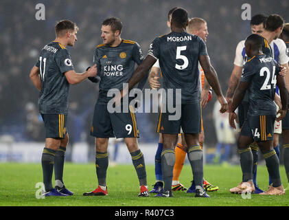 Leicester City's Jamie Vardy (2nd left) and team-mate Marc Albrighton celebrate the draw after the Premier League match at The Amex Stadium, Brighton. PRESS ASSOCIATION Photo. Picture date: Saturday November 24, 2018. See PA story SOCCER Brighton. Photo credit should read: Gareth Fuller/PA Wire. RESTRICTIONS: EDITORIAL USE ONLY No use with unauthorised audio, video, data, fixture lists, club/league logos or 'live' services. Online in-match use limited to 75 images, no video emulation. No use in betting, games or single club/league/player publications. Stock Photo