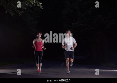 couple jogging at early morning Stock Photo