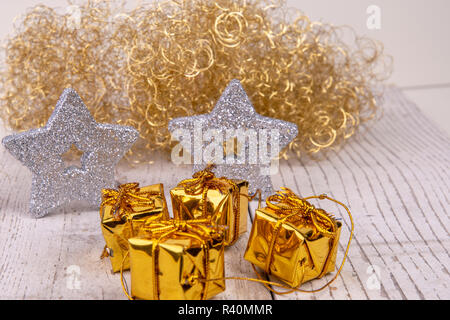 christmas background with angel golden hair on rustic wood Stock Photo