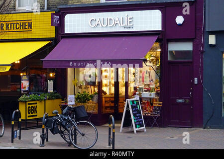 London, UK, 23 November 2018 Gourmet Burger Kitchen and Caudalie shop fronts  in Northcote Road, Battersea, Wandsworth. Stock Photo