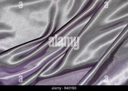 Foto de Beautiful elegant wavy light pink satin silk luxury cloth fabric  texture, abstract background design. do Stock