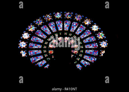 PARIS, FRANCE -  APRIL 25: Rose window at Saint - Augustin Church on april 25, 2013 in Paris. Church project was made by Wiktor Baltard. Stock Photo