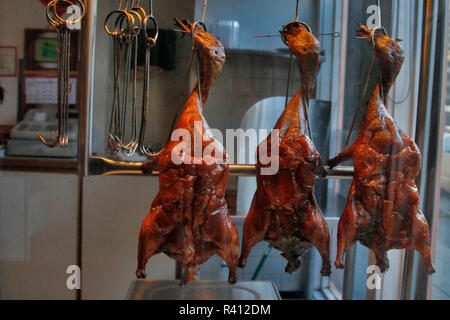 Usa, Oregon, Portland. Ducks hanging in Chinese restaurant in Chinatown. Credit as: Steve Terrill / Jaynes Gallery / DanitaDelimont.com Stock Photo