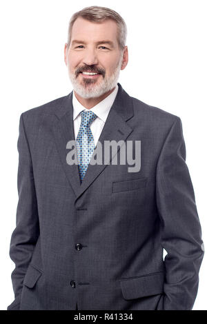 Confident smiling businessman posing in style Stock Photo