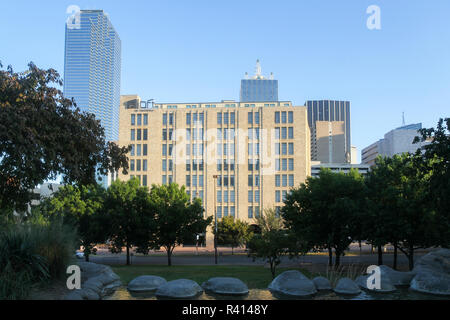 The Aloft Dallas Downtown, seen from across the street in Pioneer Plaza, Dallas, Texas, USA Stock Photo