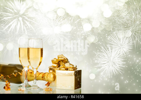 Celebrating New Year with champagne and fireworks Stock Photo