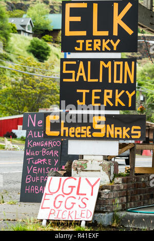 USA, Washington State. Columbia River Basin, Route 14 roadside signs for Elk and Salmon Jerky Stock Photo