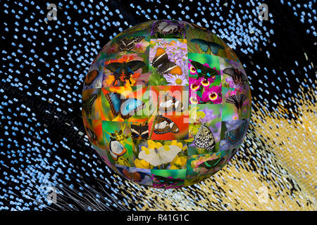 Photoshop designed globe with numerous butterfly photographs Stock Photo