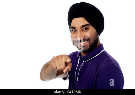 Indian guy pointing you out Stock Photo