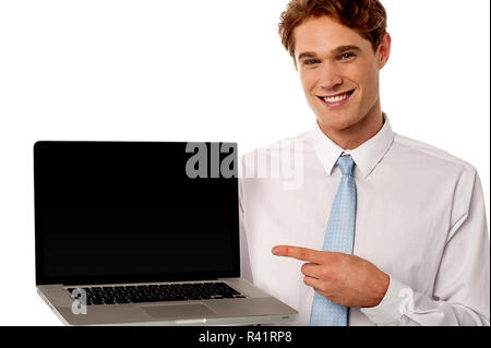 Employee showcasing brand new laptop Stock Photo