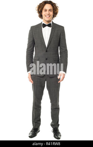 Smiling young handsome man in tuxedo Stock Photo