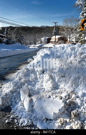 A huge pile of snow cleared from a road in Pittsburgh, Pennsylvania. Stock Photo