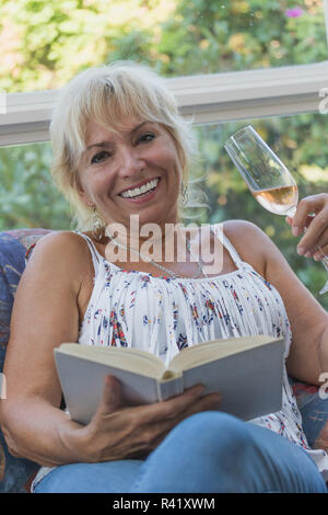Smilling senior mature blond woman Stock Photo