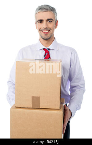 Businessman in  process of relocation Stock Photo