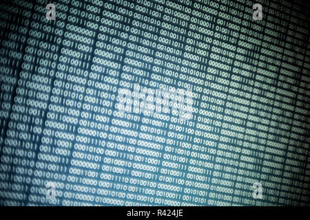 Big overload blockchain data. Blue binary data code background for internet and cyberspace security function. one and zero text on LED moniter screen. Stock Photo