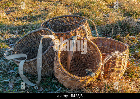 Wicker baskets handmade on autumn grass Stock Photo - Alamy