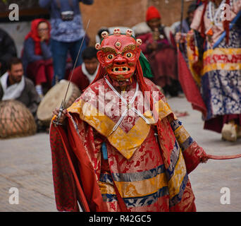 A masked monk performs at a traditional cham Tibetan Buddhist dance, Leh, Ladakh, India Stock Photo