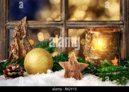 cozy seasonal decoration on the window sill Stock Photo