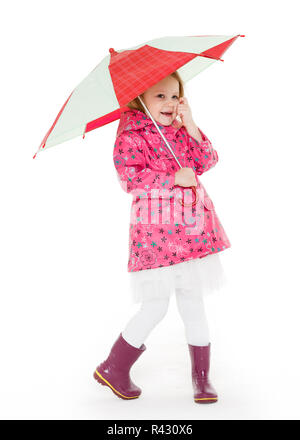 Little girl with umbrella. Stock Photo